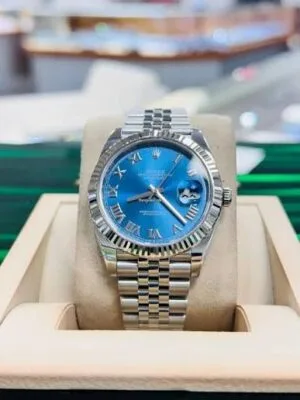 DateJust 41 126334 Clean Factory Blue Dial with Roman Markers DateJust 41 126334 Clean Factory with a Blue Dial and Roman Markers.