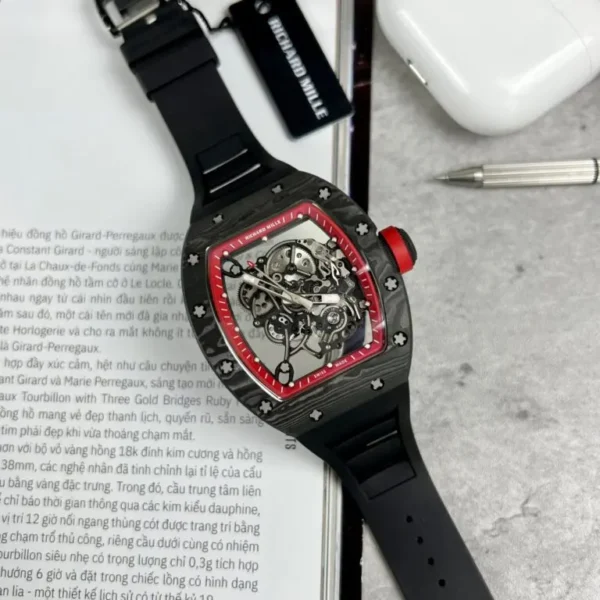 Richard Mille RM055 1:1 Black BBR Factory 50mm watch with a black tonneau-shaped case, skeleton dial, sapphire crystal, and black rubber strap.