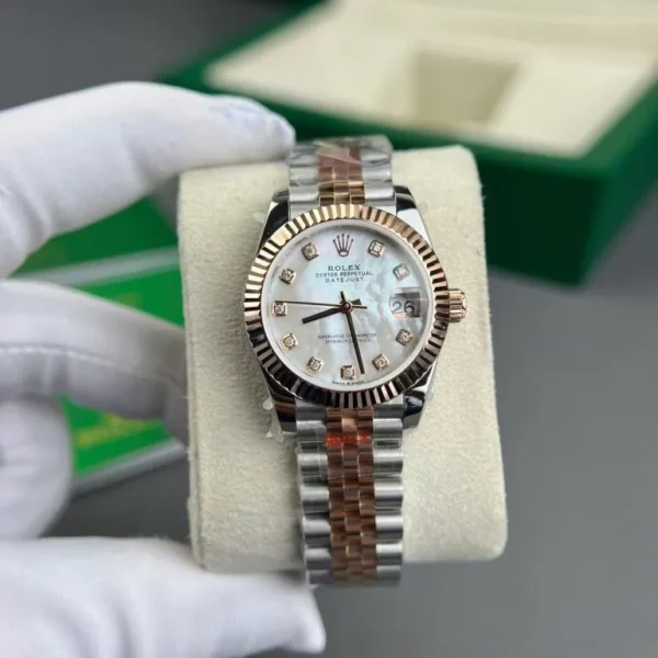 Rolex DateJust 31mm Gold Wrapped GM Factory with a Mother Of Pearl Dial and Natural Diamond Markers.