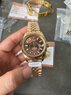 Noob Factory Rolex Sky-Dweller Super Clone with a 42mm case, fluted Ring Command bezel, Oyster bracelet, and automatic movement.