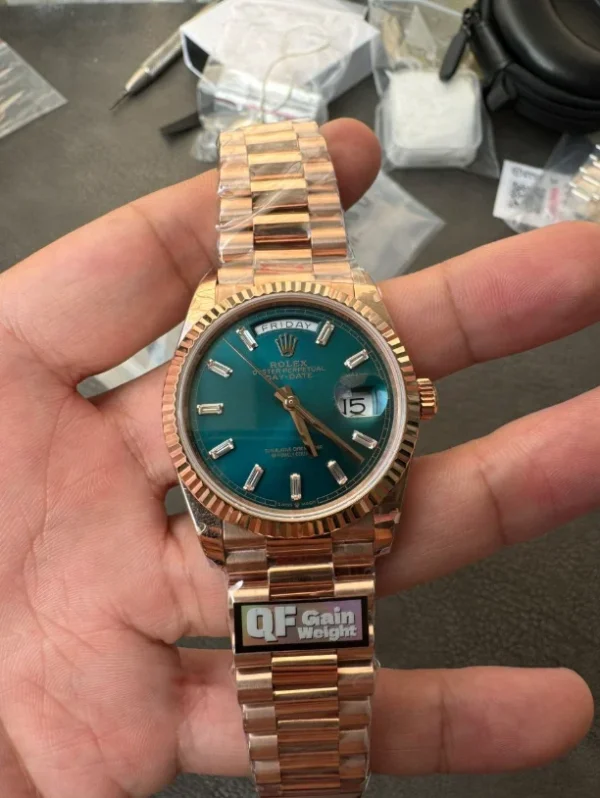 QF Rolex Day-Date 36mm Super Clone with a President bracelet and classic day and date display.