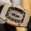 Richard Mille RM007 Gold Wrapped Watch with Moissanite Diamonds 36mm featuring a gold tonneau-shaped case, skeleton-inspired dial, automatic movement, and premium rubber strap.