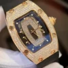 Richard Mille RM007 Gold Wrapped Watch with Moissanite Diamonds 36mm featuring a gold tonneau-shaped case, skeleton-inspired dial, automatic movement, and premium rubber strap.