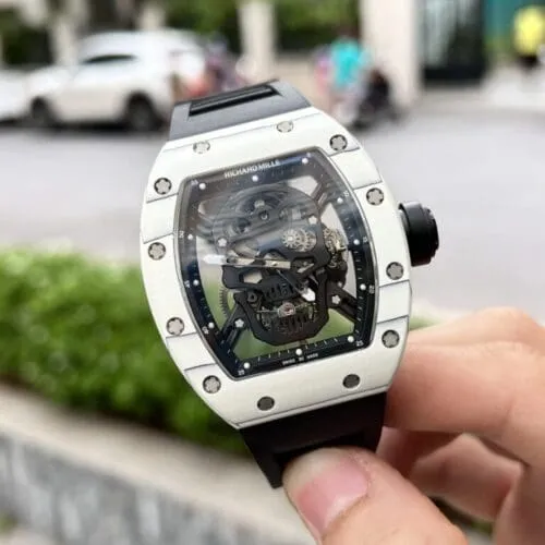 Richard Mille RM052 Tourbillon Skull Carbon 43mm luxury replica watch with a skull skeleton dial, carbon-style tonneau case, and black rubber strap.