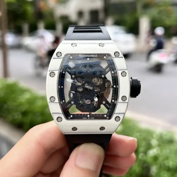 Richard Mille RM052 Tourbillon Skull Carbon 43mm luxury replica watch with a skull skeleton dial, carbon-style tonneau case, and black rubber strap.