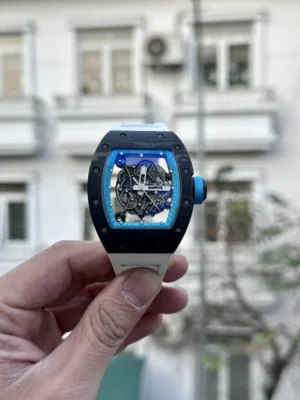 Richard Mille RM055 Full Carbon White Rubber Strap BBR 50mm watch with a full carbon tonneau case, skeletonized dial, sapphire crystal, and white rubber strap.