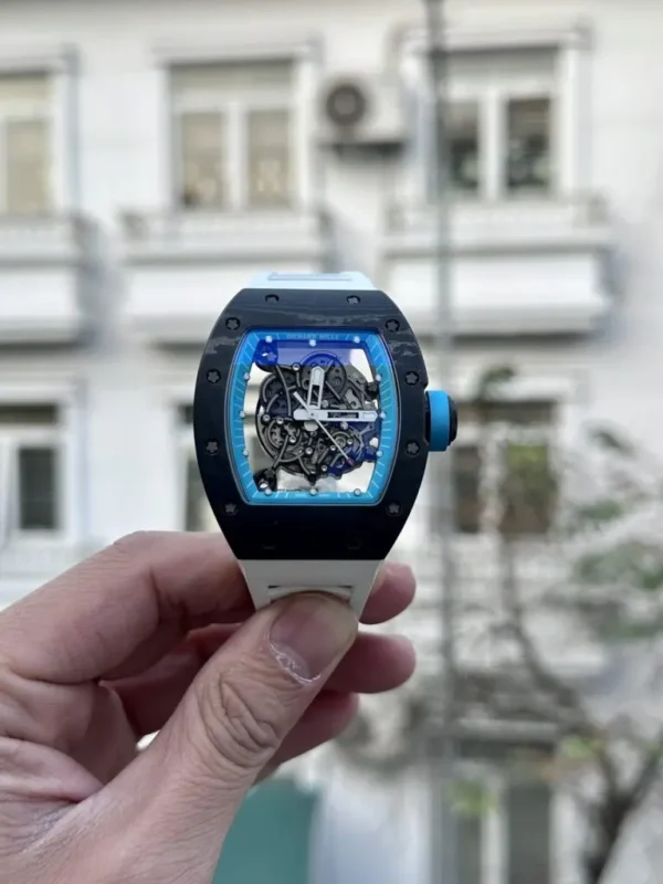 Richard Mille RM055 Full Carbon White Rubber Strap BBR 50mm watch with a full carbon tonneau case, skeletonized dial, sapphire crystal, and white rubber strap.
