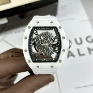 Richard Mille RM055 White Watch 50mm with a white tonneau-shaped case, skeletonized dial, sapphire crystal, and white rubber strap.