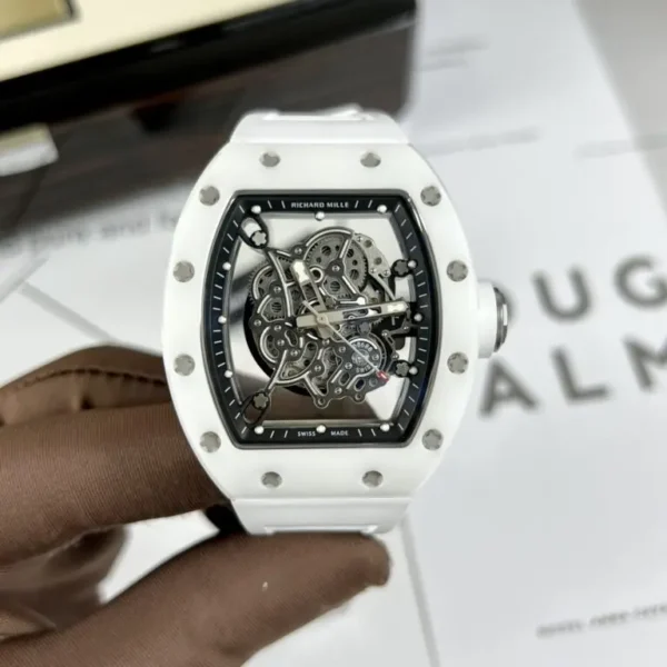 Richard Mille RM055 White Watch 50mm with a white tonneau-shaped case, skeletonized dial, sapphire crystal, and white rubber strap.