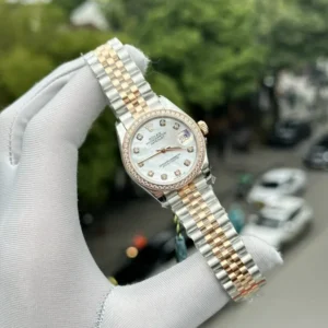 Rolex DateJust 31mm with a Mother Of Pearl Dial and Stone Bezel.
