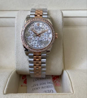 Rolex Datejust 31 FLORAL DIAMOND DIAL Super Clone Rolex DateJust 31 Super Clone with a Floral Diamond Dial.