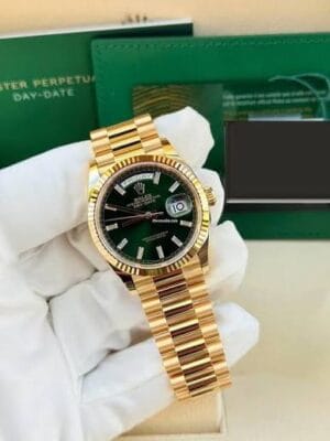 Rolex Day-Date 36mm with an 18K Yellow Gold Wrapped finish and classic Day-Date design.
