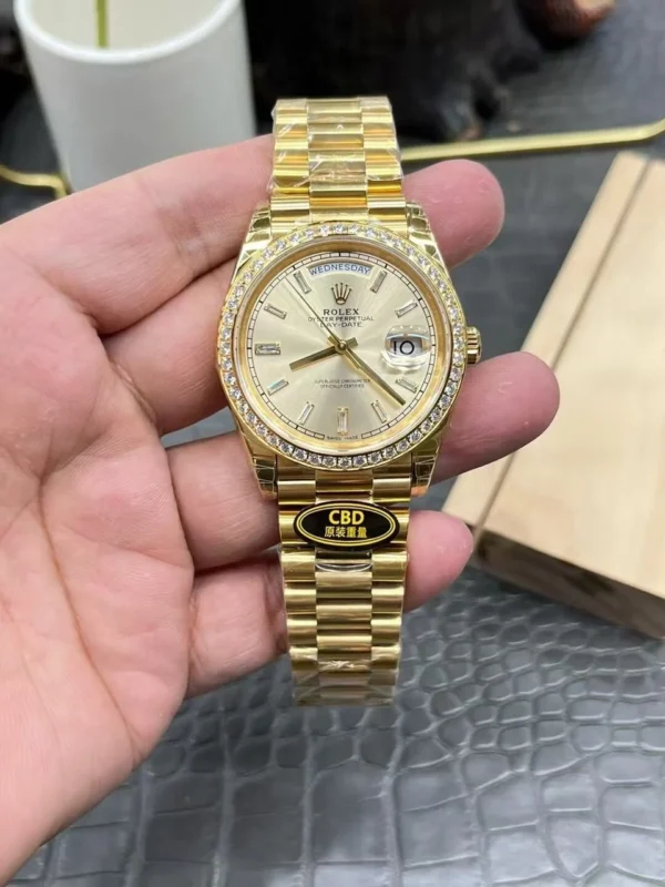 Rolex Oyster Perpetual Day-Date Super Clone with a yellow gold finish, champagne dial, and President bracelet weighing approximately 210g.