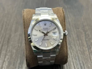 Rolex Oyster Perpetual Datejust 41 mm with a silver index dial, smooth stainless steel bezel, and Oyster bracelet.