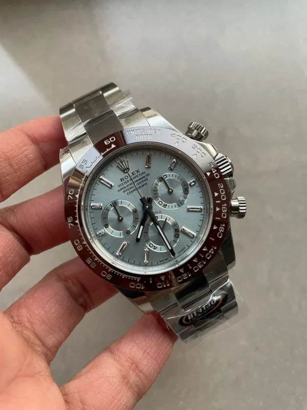8e5d1113-0725-4ddb-9ffd-4e256ff126e1-1-1 Rolex Daytona 116506 Brown Ceramic BTF Super Clone featuring a 40mm 904L stainless steel case, Ice Blue Dial, crystal markers, Brown Ceramic tachymeter bezel, Oyster bracelet, and SA4130 automatic movement