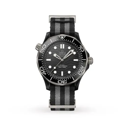 B019BAE5-9AF5-71D4-152E-404E6278E28B Omega Seamaster Diver 300M 007 Edition O21092442001002 with a tropical brown aluminium dial, Grade 2 titanium case, brown diving bezel, and black NATO fabric strap.