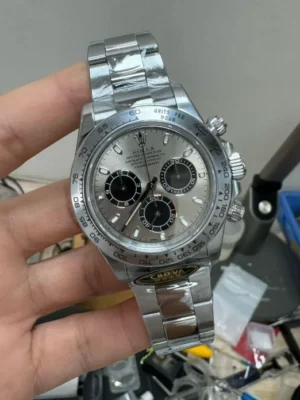 CBD Factory Rolex Daytona featuring a 40mm case, chronograph dial, Oyster bracelet, fixed tachymeter bezel, and automatic chronograph movement.