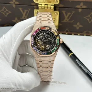 Audemars Piguet Royal Oak Openworked 15412 Super Clone with a Rose Gold frosted case, Skeleton Dial, Baguette Stone Bezel, and 41mm case.