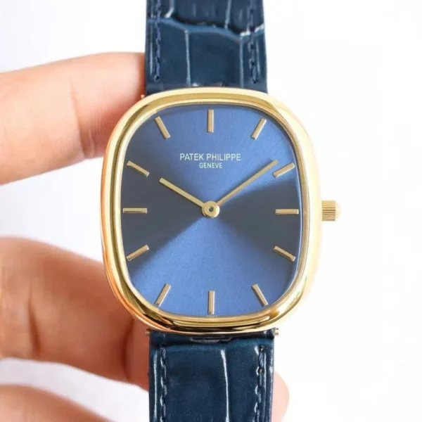 Patek Philippe Ellipse 5738R with a Blue Dial, Leather Strap, and 34×39mm case.