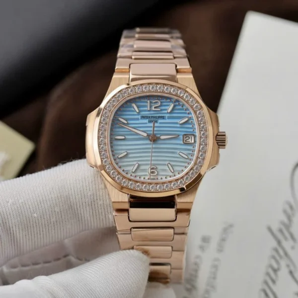 Dong-Ho-Patek-Philippe-Replica-11-Nautilus-7010R-Nu-Mat-Xanh-Trang-Day-Kim-Loai-Xuong-GR-32mm-9-768x768-1 Patek Philippe Nautilus 7010R Women 32mm with a Blue/White Dial and Metal Wire bracelet