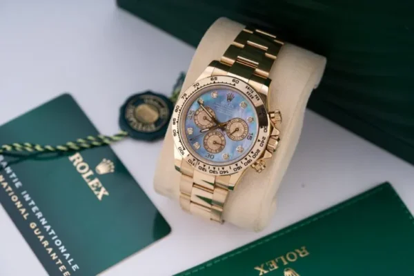 Rolex Daytona 116508 40mm with Mother of Pearl Dial by Clean Factory featuring a 904L stainless steel and yellow gold-tone case, white Mother of Pearl dial with diamond hour markers, fixed tachymeter bezel, Oyster bracelet, and 4130 Super Clone automatic chronograph movement