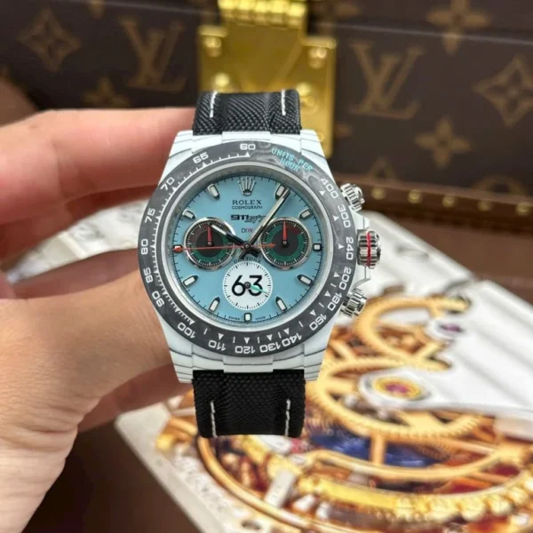 Dong-Ho-Rolex-Daytona-DiW-Ferrari-Replica-11-Mat-Tiffany-Vo-Carbon-Trang-Sieu-Nhe-40mm-2-768x768-1 Rolex Daytona DIW Ferrari Tiffany Dial Super Clone Watch featuring a 40mm forged carbon case, Tiffany Blue Dial, fixed carbon tachymeter bezel, black nylon strap, and automatic chronograph movement
