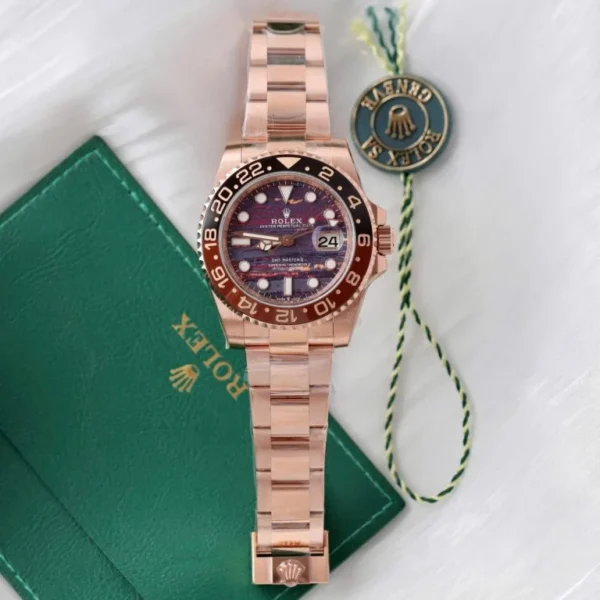 Rolex GMT-Master II 126715 CHNR THBF Super Clone with a 40mm Everose gold-tone case, Black Dial, brown and black Cerachrom bezel, Oyster bracelet, and Clone Rolex 3285 automatic movement.