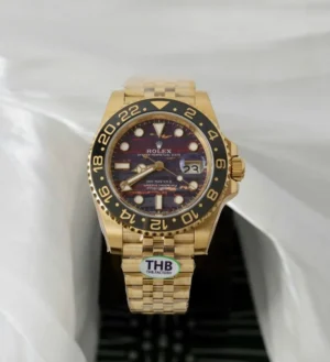 Rolex GMT-Master II 126718 GRNR THBF Super Clone with a 40mm yellow gold-tone case, Grey and Black Cerachrom bezel, Black Dial, Oyster bracelet, and Clone Rolex 3285 automatic movement.