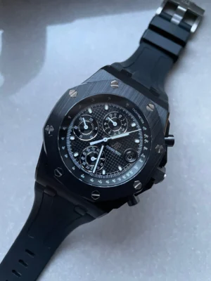 IMG-20230524-WA0112-1 Audemars Piguet Royal Oak Offshore Chronograph with a black dial, ceramic case, and black rubber strap.