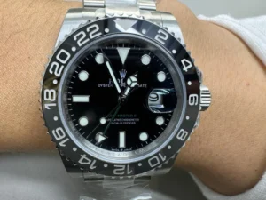 Rolex GMT-Master II Bruce Wayne 126710GRNR Super Clone with a Black Dial, Black and Grey Cerachrom bezel, Oyster bracelet, and Clone Rolex 3285 automatic movement.