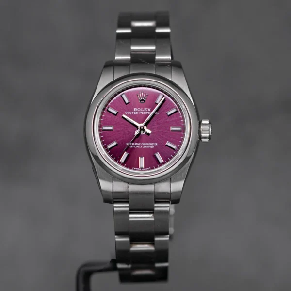 OP26Purple Oyster Perpetual 26mm Purple Dial featuring a 26mm stainless steel case, elegant purple dial, smooth bezel, Oyster bracelet, and automatic movement.