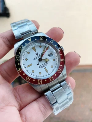 Rolex Vintage GMT-Master 6542 Super Clone with a Black and Red 24-hour bezel, White Dial, Oyster bracelet, and A2836 automatic movement.