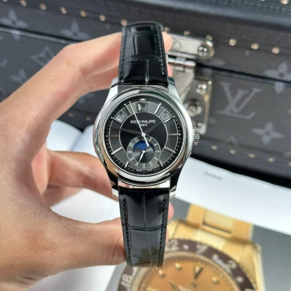 Patek Philippe Super Clone Watch Complications 5205G Gray Dial Leather Strap 40mm Patek Philippe Super Clone Watch Complications 5205G with a Gray Dial, Leather Strap, and 40mm case.