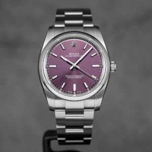 Rolex-Oyster-Perpetual-Indonesia-_1 Oyster Perpetual 34mm Red Grape Dial featuring a 34mm stainless steel case, Red Grape dial, smooth bezel, Oyster bracelet, and automatic movement.