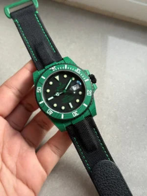 WhatsApp-Image-2025-09-17-at-21.23.51-768x1024-1 Rolex Submariner DIW Green Carbon Super Clone featuring a green forged carbon case, Black Dial, black ceramic bezel, black nylon strap, sapphire crystal, and VS3135 automatic movement.
