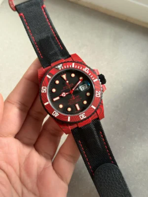 WhatsApp-Image-2025-09-17-at-21.25.37-scaled-1 Rolex Submariner DIW Red Carbon Super Clone featuring a red forged carbon case, Black Dial, black ceramic bezel, black nylon strap, sapphire crystal, and VS3135 automatic movement.
