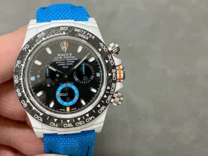 Daytona DIW White Carbon N6F 1:1 Best Edition featuring a Black Dial, white carbon case, fixed carbon tachymeter bezel, blue nylon strap, and SA4130 automatic chronograph movement.