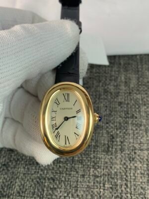 Cartier Baignoire WGBA0007 Black Baignoire WGBA0007-inspired ladies' watch with white Roman numeral dial, black-and-gold-tone case, and stainless steel bracelet