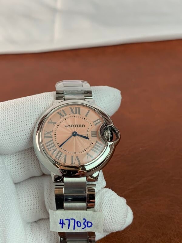 Cartier Ballon Bleu 33 WSBB0046 Cartier Ballon Bleu 33 WSBB0046 women's watch with pink dial, Roman numeral markers, and stainless steel bracelet