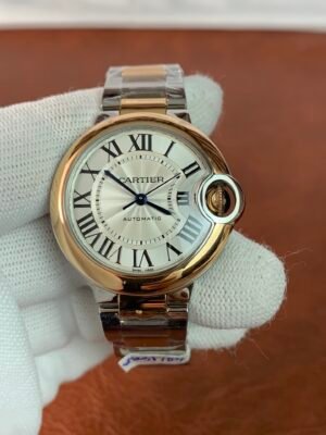 Cartier Ballon Bleu 42 W2BB0004 Rose Gold Ballon Bleu W2BB0004-inspired men's watch with silver Roman numeral dial, round two-tone case, and steel bracelet with pink-gold color