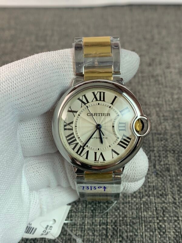 Cartier Ballon Bleu W69008Z3 Ballon Bleu 36 W2BB0012-inspired watch with silver Roman numeral dial, round two-tone case, and yellow-gold-colored bracelet accents