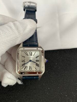 Cartier De Santos WSSA0023 Square Santos Dumont WSSA0023-inspired watch with silver Roman numeral dial, steel-colored case, and blue leather strap