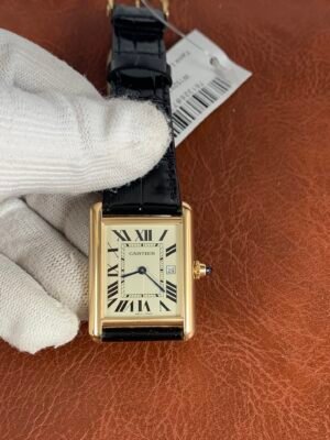 Cartier Tank Louis W1529756 Gold Rectangular Tank Must Large-inspired men's watch with white Roman numeral dial, steel case, and black leather strap