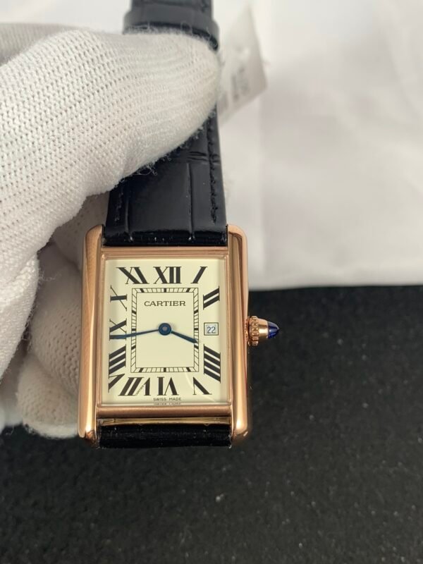 Tank Must Large-inspired men's watch with white Roman numeral dial, rectangular stainless steel case, and black leather strap