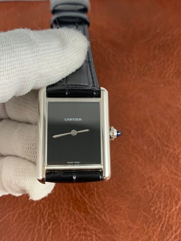Cartier Tank WSTA0072 Tank Must Small WSTA0072-inspired women's watch with white Roman numeral dial, rectangular steel case, and matching bracelet