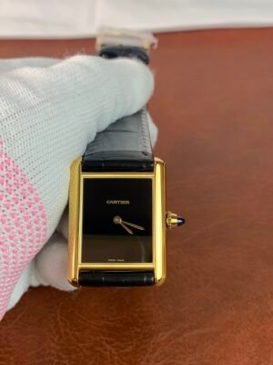 i1693902672_1603_3 Tank Must de Cartier WGTA0091-inspired women's watch with rectangular steel case, minimalist black dial, and black leather strap