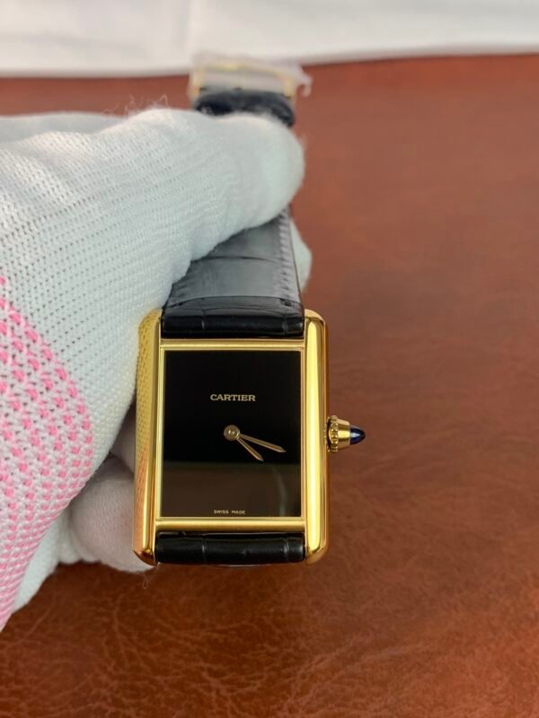 i1693902672_1603_3 Tank Must de Cartier WGTA0091-inspired women's watch with rectangular steel case, minimalist black dial, and black leather strap